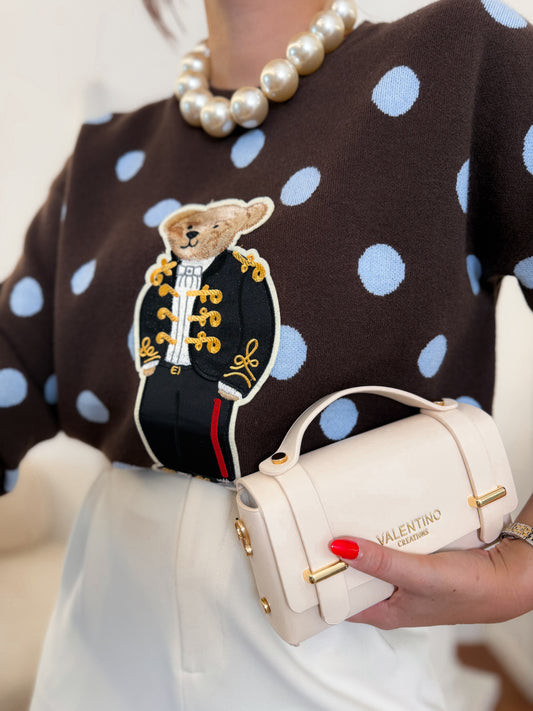 Maglione a pois con orso ricamato