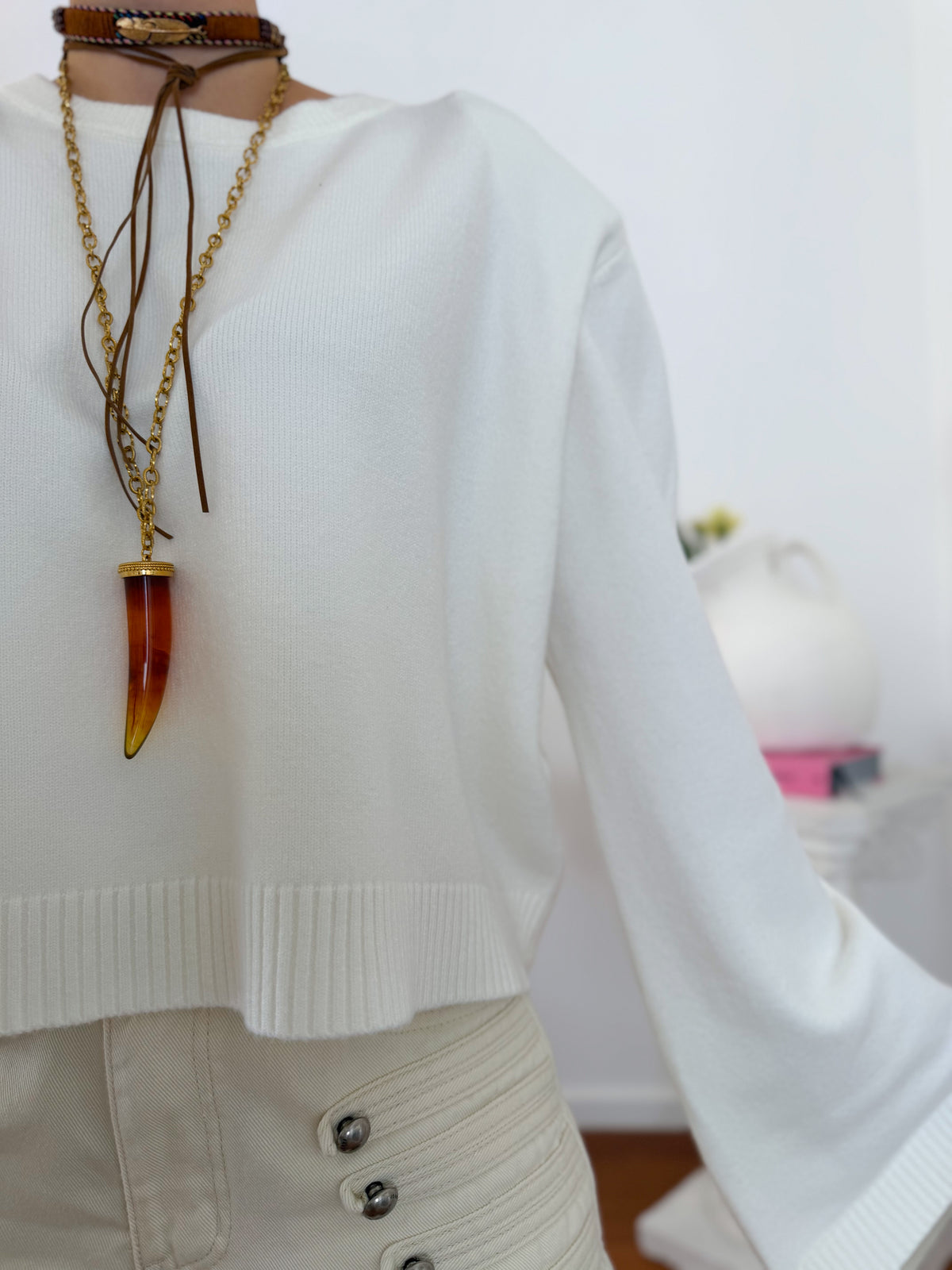 Camisola de malha com ombreiras e mangas largas